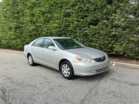 2004 Toyota Camry for sale at GEN X AUTO INC in Islip NY