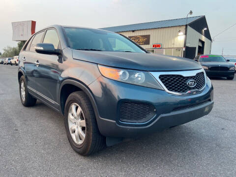 2011 Kia Sorento for sale at BELOW BOOK AUTO SALES in Idaho Falls ID