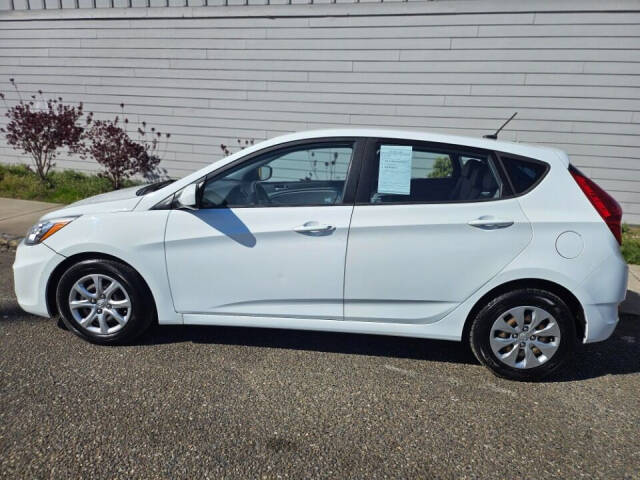 2016 Hyundai ACCENT for sale at BENCHMARK AUTO SALES in Parkland, WA