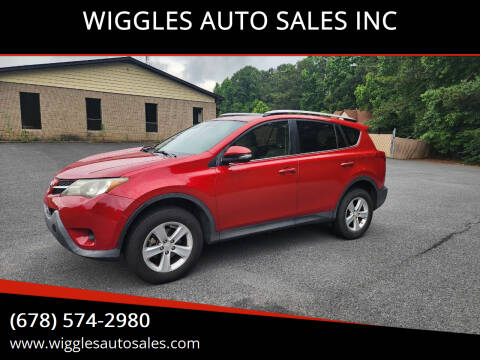 2013 Toyota RAV4 for sale at WIGGLES AUTO SALES INC in Mableton GA