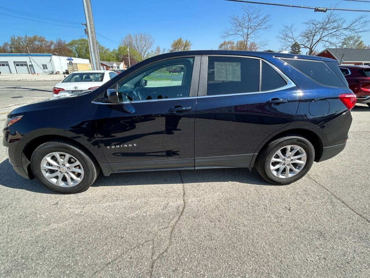 Used 2021 Chevrolet Equinox LT with VIN 3GNAXKEV9MS100720 for sale in Algoma, WI