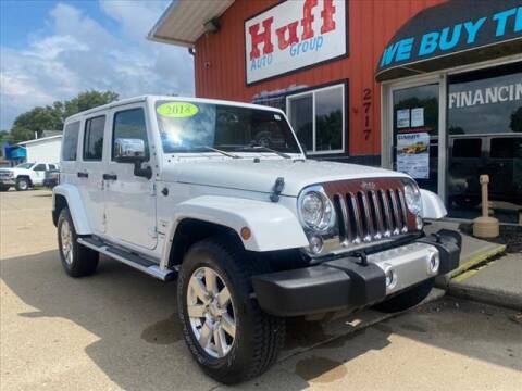 2018 Jeep Wrangler JK Unlimited for sale at HUFF AUTO GROUP in Jackson MI