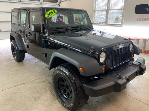 2012 Jeep Wrangler Unlimited for sale at G & G Auto Sales in Steubenville OH