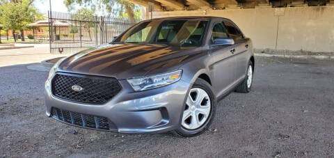 2014 Ford Taurus for sale at MT Motor Group LLC in Phoenix AZ