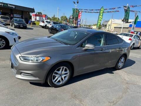 2013 Ford Fusion for sale at Ideal Car Sales Turlock in Turlock CA