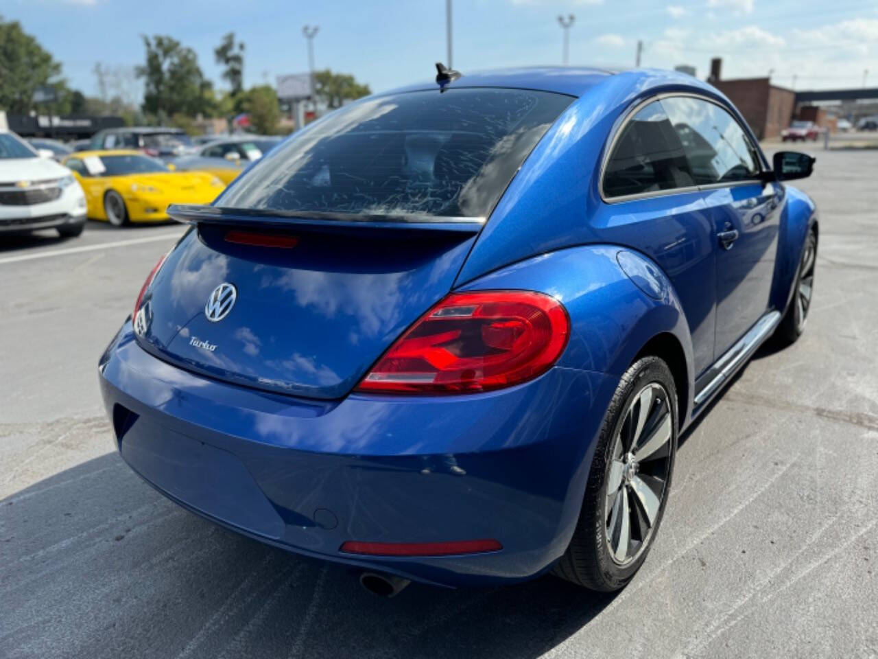 2013 Volkswagen Beetle for sale at Opus Motorcars in Utica, MI