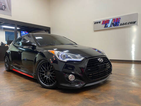 2014 Hyundai Veloster for sale at Driveline LLC in Jacksonville FL