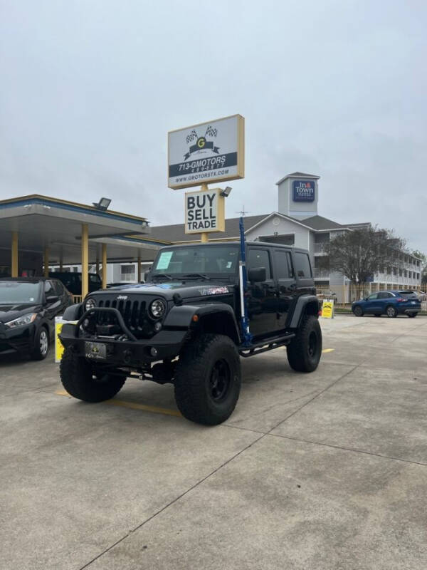 2014 Jeep Wrangler Unlimited for sale at Houston Used Auto Sales in Houston TX