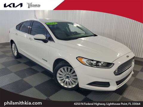 2016 Ford Fusion Hybrid for sale at PHIL SMITH AUTOMOTIVE GROUP - Phil Smith Kia in Lighthouse Point FL