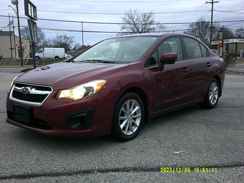 2012 Subaru Impreza for sale at MIRACLE AUTO SALES in Cranston RI