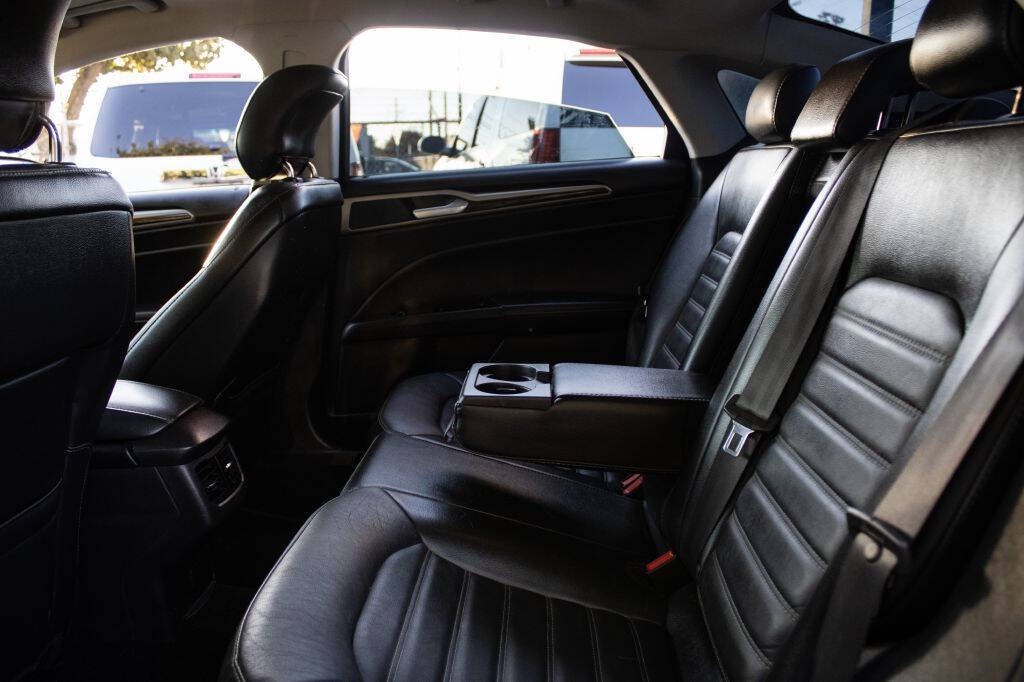 2014 Ford Fusion for sale at SUBLIME AUTO in Fresno, CA