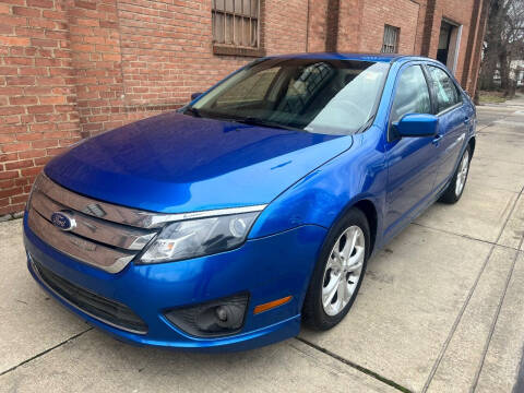 2012 Ford Fusion for sale at Domestic Travels Auto Sales in Cleveland OH