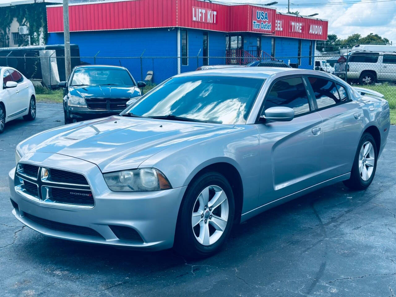 2013 Dodge Charger for sale at NOVA AUTO SALES in Orlando, FL