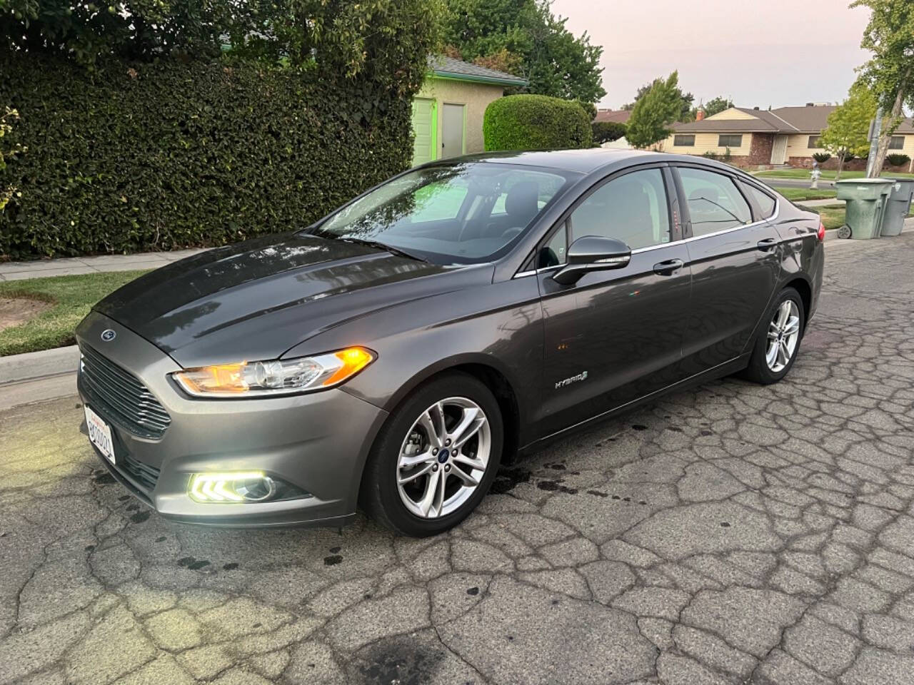 2016 Ford Fusion Hybrid for sale at AUTO 4 LESS in Fresno, CA