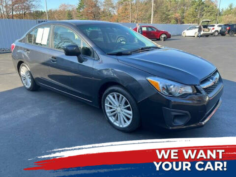 2013 Subaru Impreza for sale at LAIRD SALES AND SERVICE in Muskegon MI