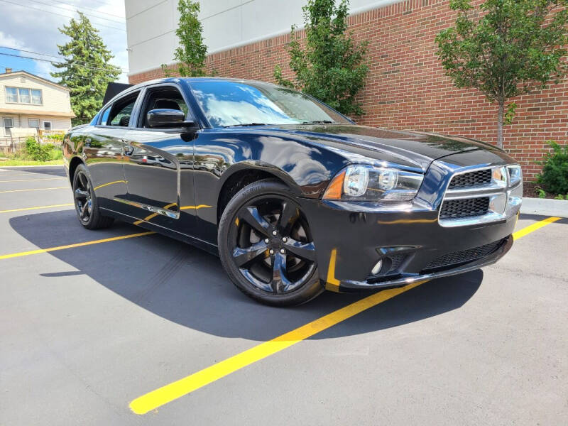 2014 Dodge Charger for sale at Dymix Used Autos & Luxury Cars Inc in Detroit MI