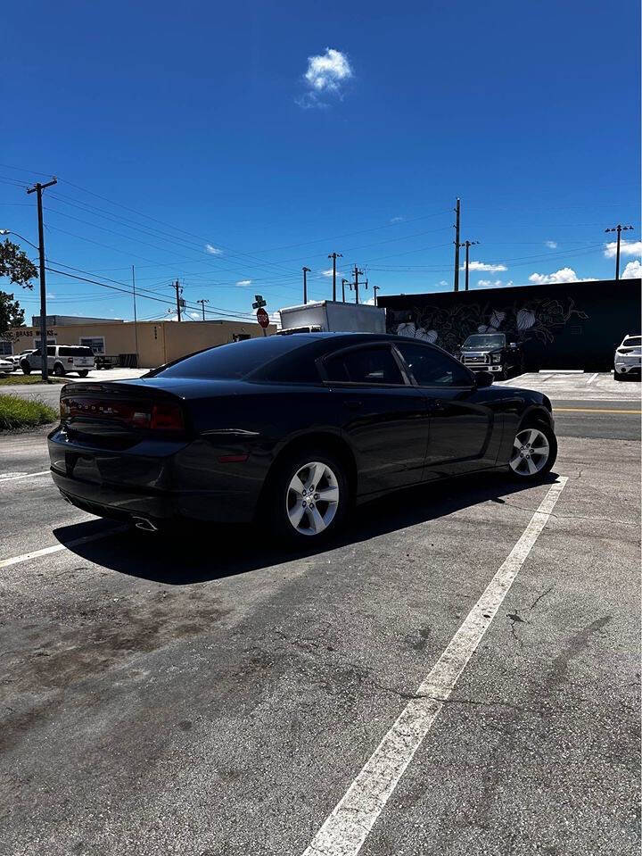 2012 Dodge Charger for sale at ALPHA AUTOMOTIVE SALES in Oakland Park, FL