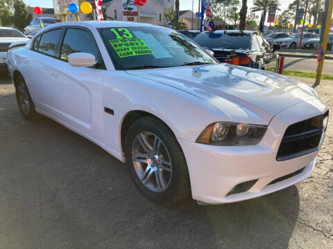 2013 Dodge Charger for sale at CROWN AUTO INC, in South Gate CA