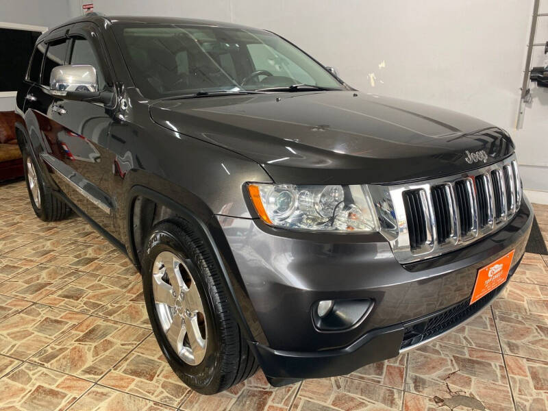 2011 Jeep Grand Cherokee for sale at TOP SHELF AUTOMOTIVE in Newark NJ