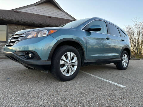 2014 Honda CR-V for sale at Jim's Hometown Auto Sales LLC in Cambridge OH