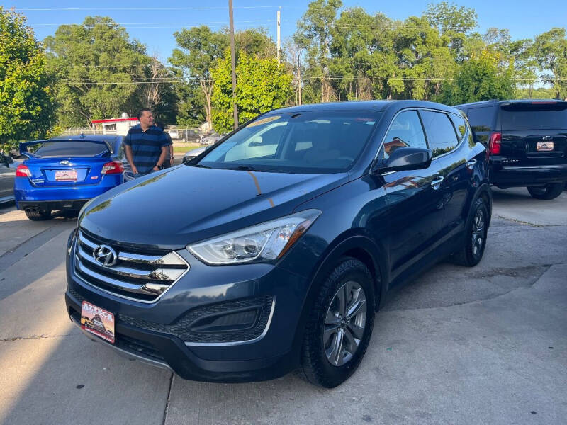 2015 Hyundai Santa Fe Sport for sale at Azteca Auto Sales LLC in Des Moines IA