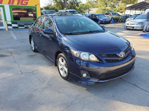 2013 Toyota Corolla for sale at AUTO TOURING in Orlando FL