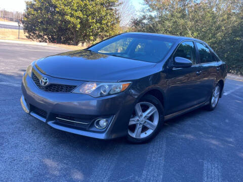2012 Toyota Camry for sale at Cheko SW Auto Sales LLC in Suwanee GA