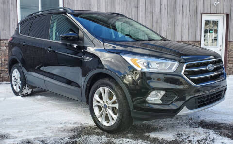 2018 Ford Escape for sale at SMITH FAMILY CAR STORE INC in Roaring Spring PA