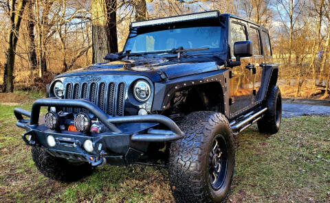 2015 Jeep Wrangler Unlimited for sale at GOLDEN RULE AUTO in Newark OH