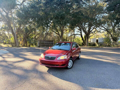 2008 Toyota Corolla for sale at Carnaval Auto Group LLC in Tampa FL