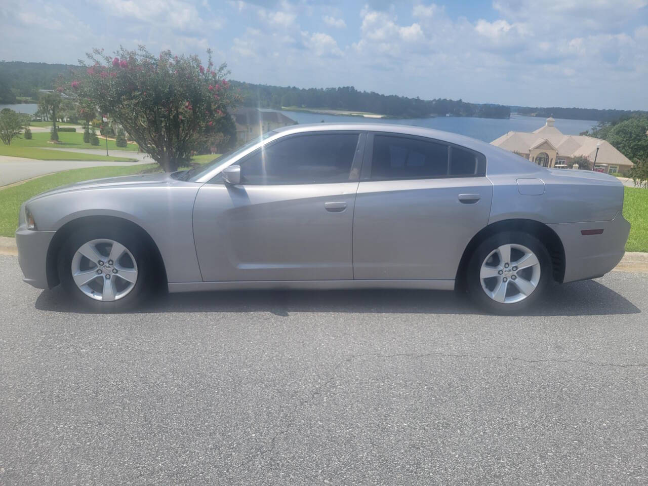 2014 Dodge Charger for sale at Connected Auto Group in Macon, GA