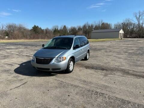 2005 Chrysler Town and Country for sale at Caruzin Motors in Flint MI