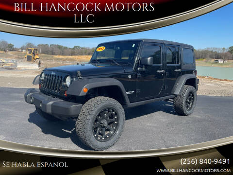 2013 Jeep Wrangler Unlimited for sale at BILL HANCOCK MOTORS LLC in Albertville AL