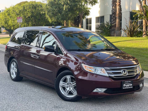 2013 Honda Odyssey for sale at MILLENNIUM MOTORS in Van Nuys CA