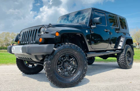 2008 Jeep Wrangler Unlimited for sale at PennSpeed in New Smyrna Beach FL