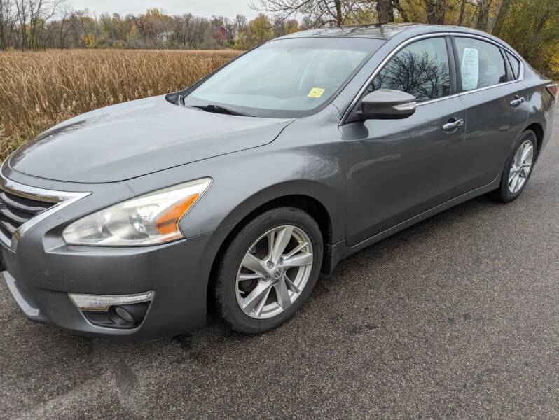 2015 Nissan Altima for sale at Car Dude in Madison Lake MN