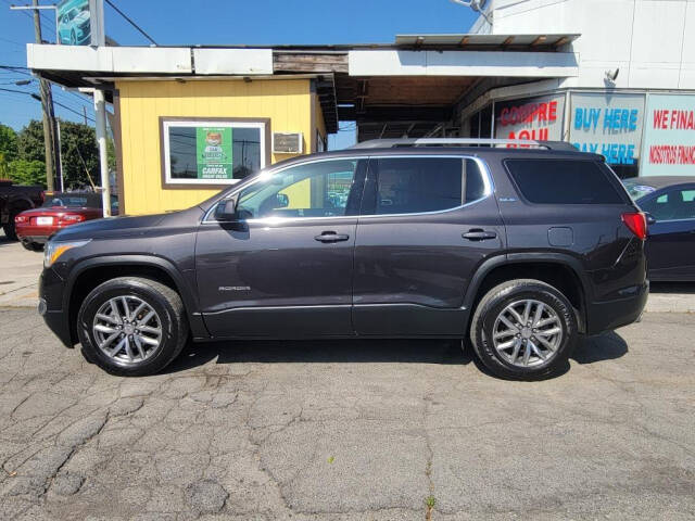 2018 GMC Acadia for sale at DAGO'S AUTO SALES LLC in Dalton, GA