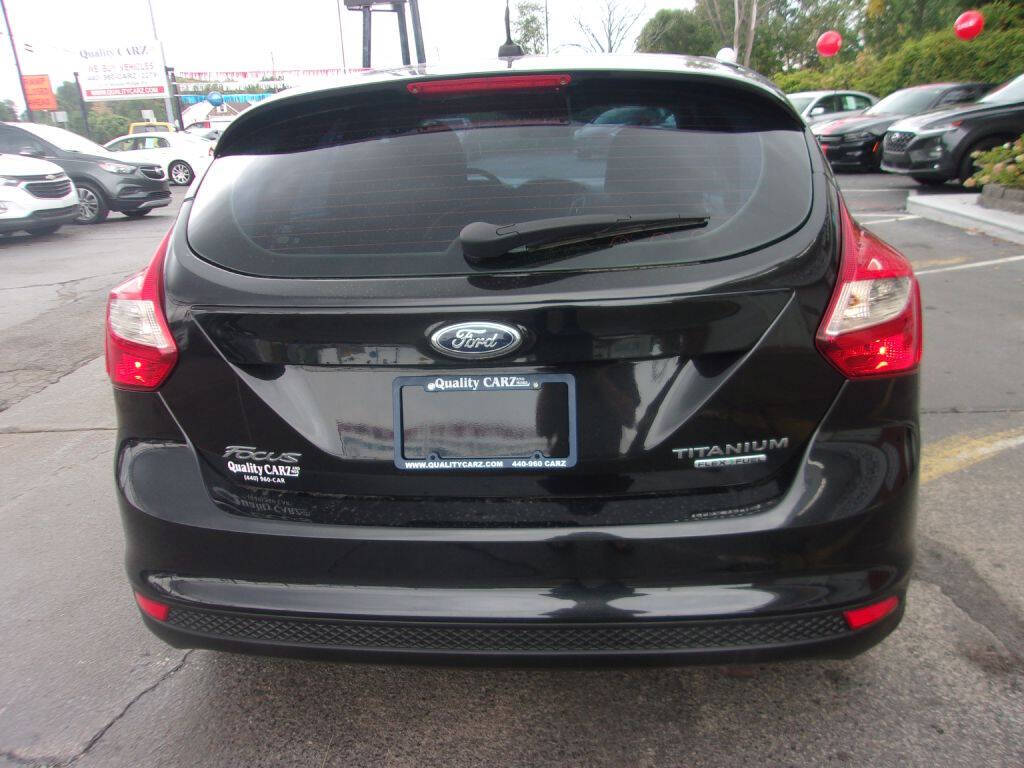 Black 2012 Ford Focus Titanium Titanium 4dr Hatchback 2