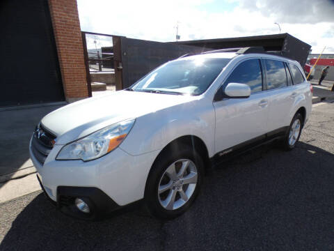 2013 Subaru Outback for sale at J & E Auto Sales in Phoenix AZ