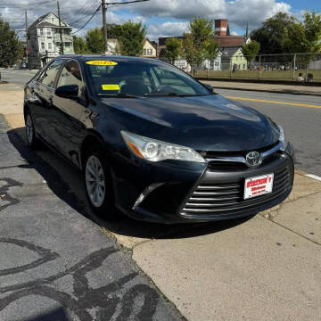 2015 Toyota Camry for sale at A & J AUTO GROUP in New Bedford MA