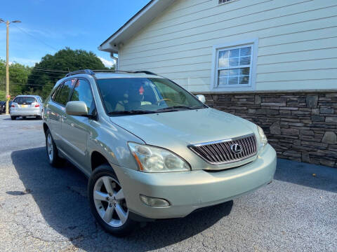 2006 Lexus RX 330 for sale at NO FULL COVERAGE AUTO SALES LLC in Austell GA