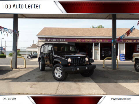 2014 Jeep Wrangler Unlimited for sale at Top Auto Center in Quakertown PA