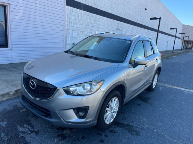 2014 Mazda CX-5 for sale at Georgia Auto Collection in Warner Robins, GA