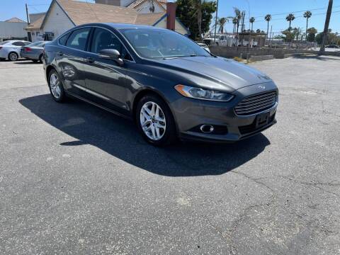 2015 Ford Fusion for sale at E and M Auto Sales in Bloomington CA