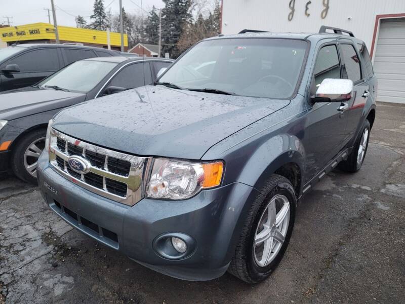2011 Ford Escape for sale at J & J Used Cars inc in Wayne MI