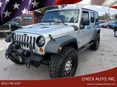 2010 Jeep Wrangler Unlimited for sale at CHECK AUTO, INC. in Tampa FL