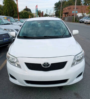 2009 Toyota Corolla for sale at Howe's Auto Sales in Lowell MA