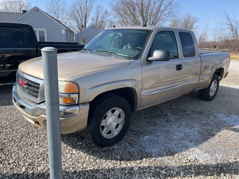 2004 GMC Sierra 1500 for sale at HEDGES USED CARS in Carleton MI