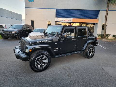 2014 Jeep Wrangler Unlimited for sale at AUTOBOTS FLORIDA in Pompano Beach FL