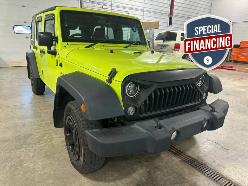 2016 Jeep Wrangler Unlimited for sale at Postal Pete in Galena IL
